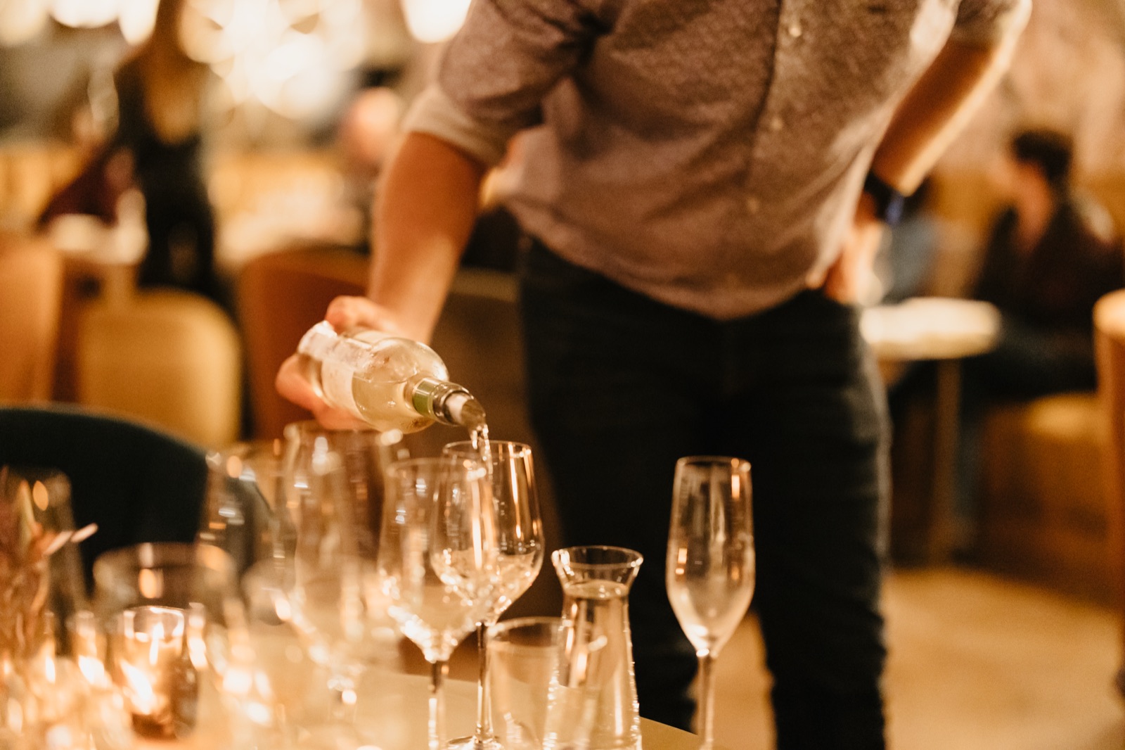 A glass being poured at an Erinvale Wine Society evening