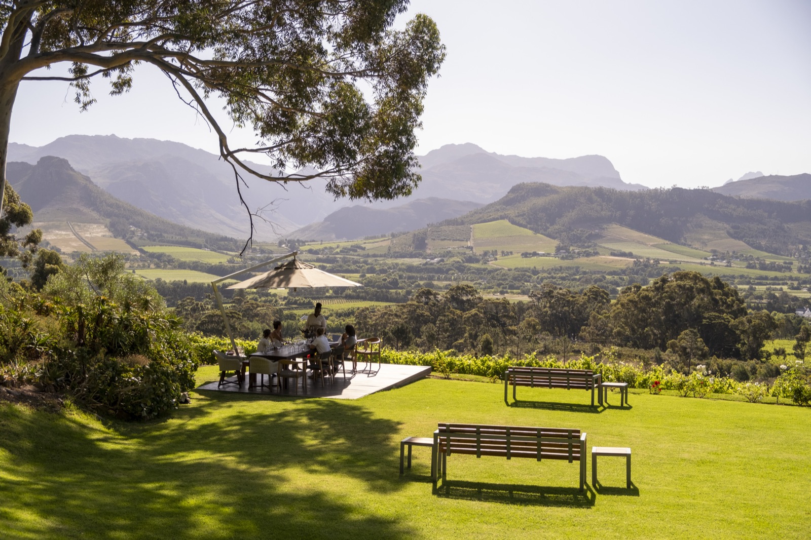 A long lunch under an umbrella overlooking the Franschhoek valley and mountains