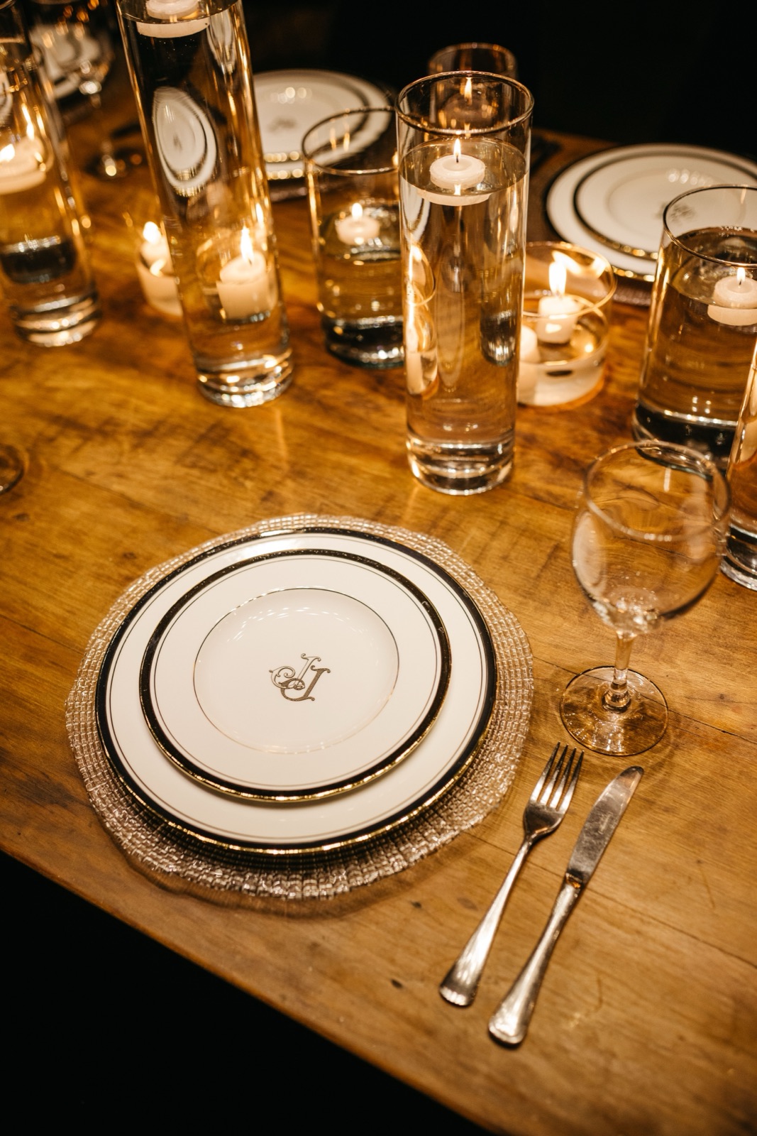 An elegant candlelit place setting (illustrative photo, not JAN Franschhoek's own table)
